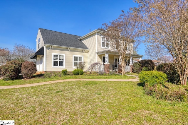 view of front of home with a front yard