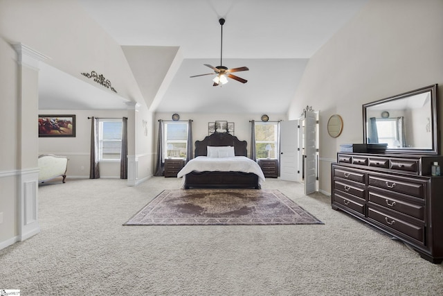 bedroom featuring high vaulted ceiling, light colored carpet, baseboards, and ceiling fan