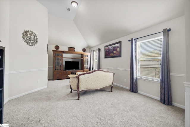 carpeted living room featuring visible vents, baseboards, and lofted ceiling