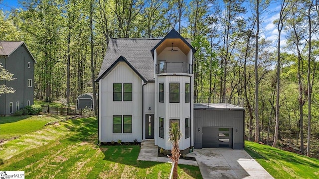 517 Windham Ln, Easley, SC 29642 - view of front of home featuring roof with shingles, fence, a front lawn, a balcony, and driveway