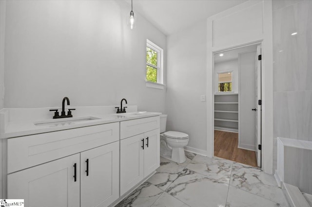 517 Windham Ln, Easley, SC 29642 - full bath with toilet, double vanity, marble finish floor, and a sink