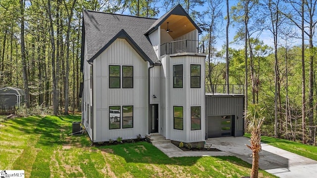 517 Windham Ln, Easley, SC 29642 - view of front of property with board and batten siding, ceiling fan, a balcony, a shingled roof, and driveway