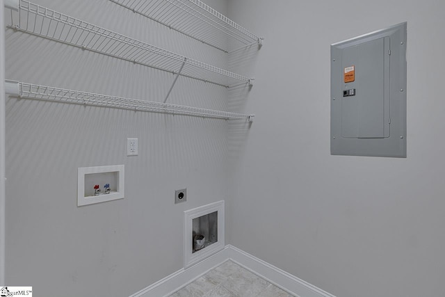 washroom featuring hookup for an electric dryer, washer hookup, electric panel, baseboards, and laundry area