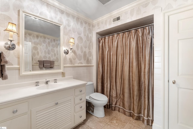 bathroom featuring vanity, ornamental molding, visible vents, toilet, and wallpapered walls