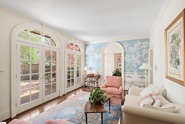 sunroom / solarium featuring french doors