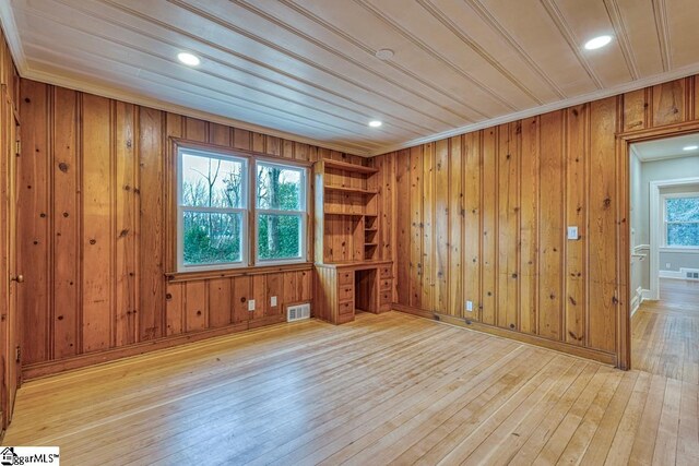 506 Parkview Dr, Spartanburg, SC 29302 - unfurnished room featuring crown molding, wood walls, wood-type flooring, and visible vents