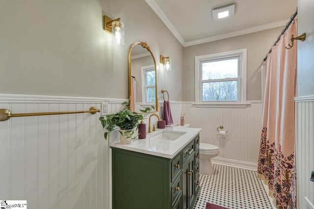 506 Parkview Dr, Spartanburg, SC 29302 - full bath with ornamental molding, toilet, wainscoting, vanity, and tile patterned floors