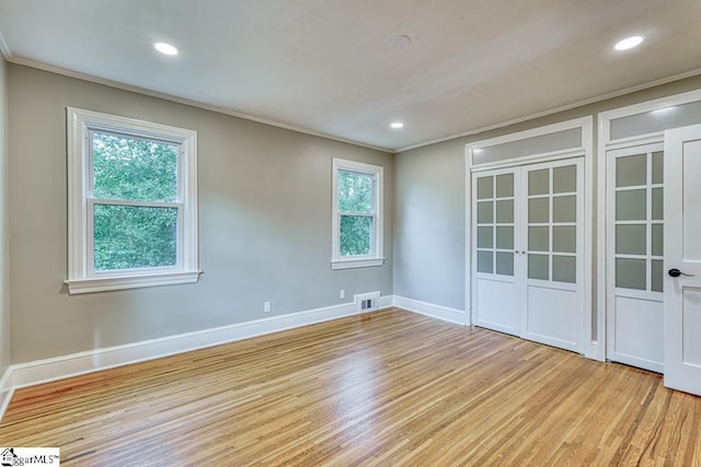 506 Parkview Dr, Spartanburg, SC 29302 - empty room with light wood-style floors, ornamental molding, visible vents, recessed lighting, and baseboards