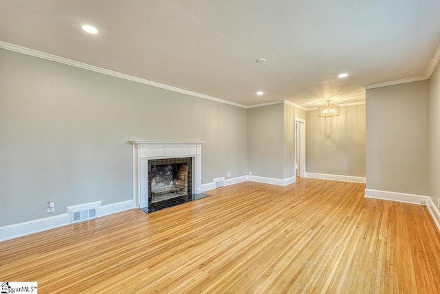 506 Parkview Dr, Spartanburg, SC 29302 - unfurnished living room featuring a tiled fireplace, visible vents, baseboards, and an inviting chandelier