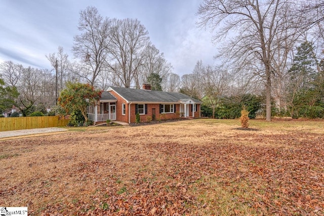 506 Parkview Dr, Spartanburg, SC 29302 - ranch-style home with brick siding, fence, and a chimney