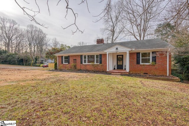 506 Parkview Dr, Spartanburg, SC 29302 - view of front of property featuring a chimney, a front lawn, and brick siding