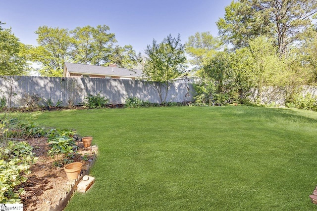 view of yard featuring fence