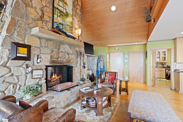 902 Altamont Rd, Greenville, SC 29609 - living area with light wood-style flooring, wooden ceiling, a fireplace, and ornamental molding