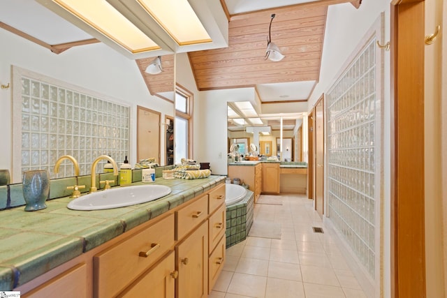 902 Altamont Rd, Greenville, SC 29609 - bathroom featuring a bath, vanity, tile patterned flooring, vaulted ceiling, and wooden ceiling