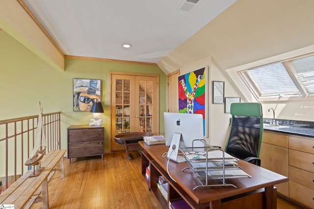 902 Altamont Rd, Greenville, SC 29609 - office featuring light wood-type flooring, recessed lighting, visible vents, a skylight, and a sink