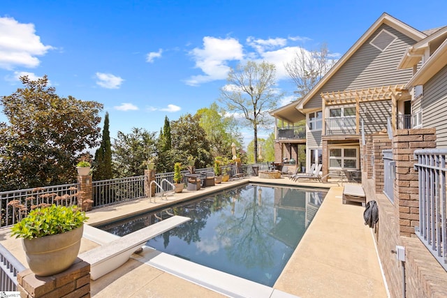 902 Altamont Rd, Greenville, SC 29609 - view of pool with a pergola, a diving board, a patio, fence, and a fenced in pool