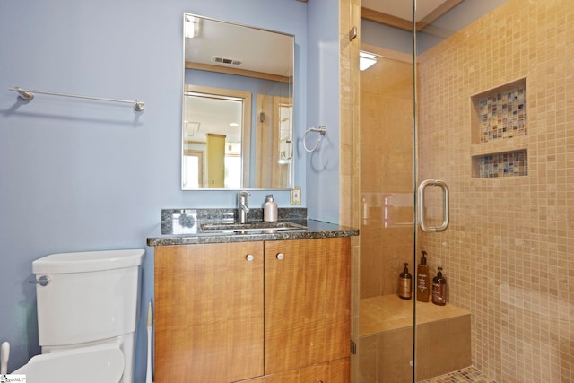 902 Altamont Rd, Greenville, SC 29609 - bathroom featuring toilet, a stall shower, and vanity