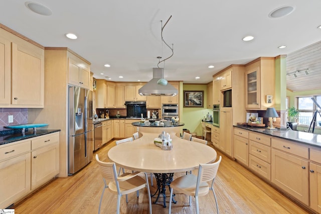 902 Altamont Rd, Greenville, SC 29609 - kitchen featuring island range hood, light wood-style flooring, light brown cabinetry, and stainless steel appliances
