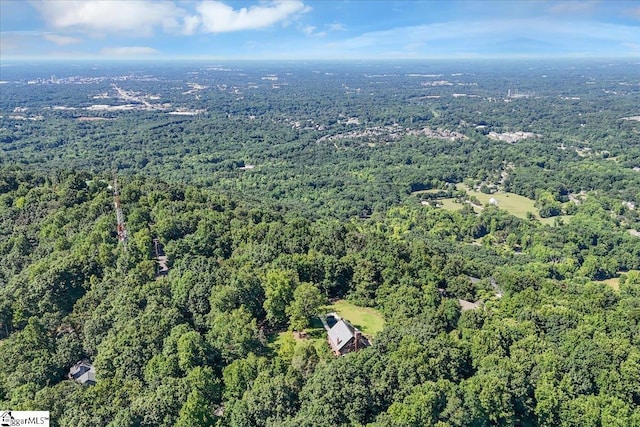 bird's eye view featuring a forest view