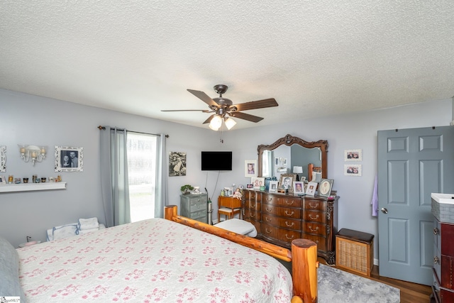 100 Sonora Dr, Easley, SC 29640 - bedroom featuring a textured ceiling, wood finished floors, and ceiling fan