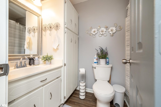 100 Sonora Dr, Easley, SC 29640 - full bathroom with vanity, baseboards, toilet, and wood finished floors