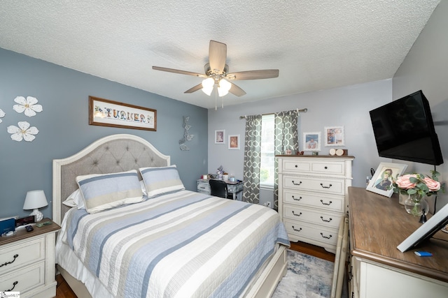 100 Sonora Dr, Easley, SC 29640 - bedroom featuring a textured ceiling, wood finished floors, and a ceiling fan