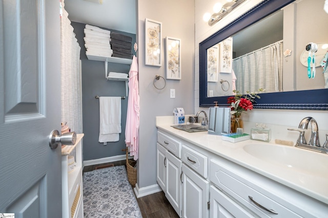 100 Sonora Dr, Easley, SC 29640 - full bathroom with a sink, baseboards, double vanity, and wood finished floors