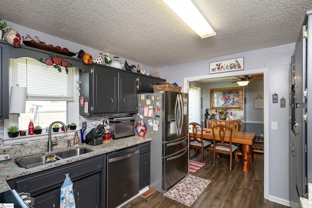 100 Sonora Dr, Easley, SC 29640 - kitchen with a sink, a ceiling fan, dark wood finished floors, a textured ceiling, and stainless steel appliances