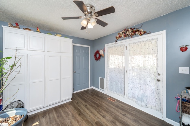 100 Sonora Dr, Easley, SC 29640 - bedroom featuring visible vents, baseboards, ceiling fan, a textured ceiling, and dark wood-style floors