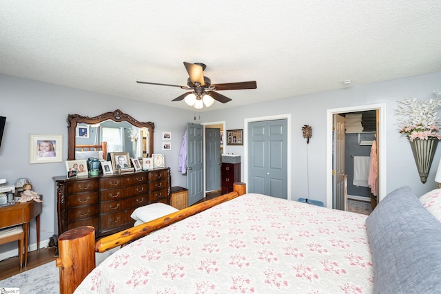 100 Sonora Dr, Easley, SC 29640 - bedroom featuring ceiling fan, a textured ceiling, ensuite bathroom, and wood finished floors