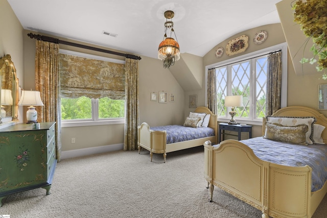 bedroom with light carpet, visible vents, multiple windows, and vaulted ceiling