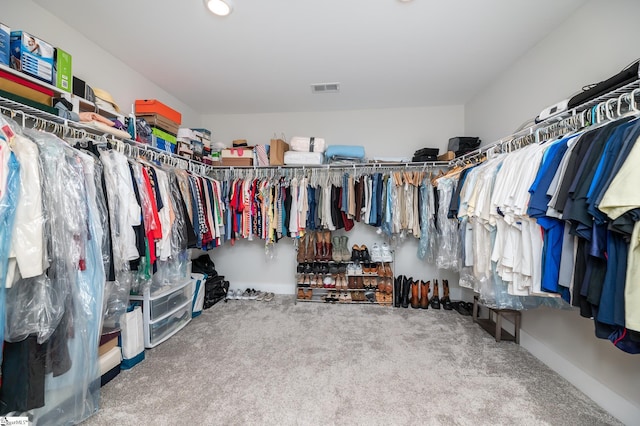 walk in closet with carpet flooring and visible vents