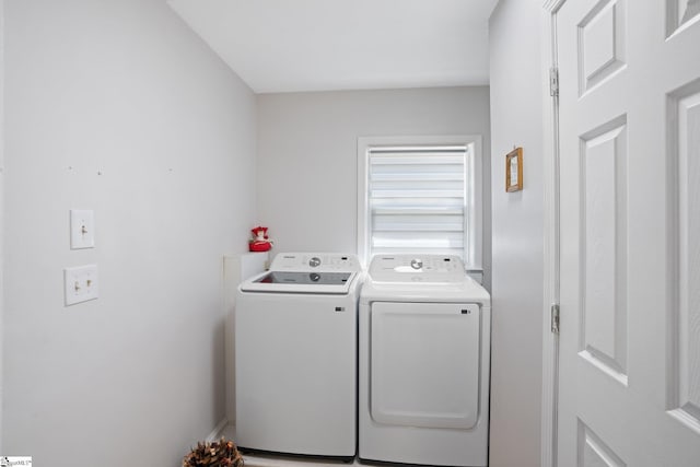 laundry room with independent washer and dryer and laundry area