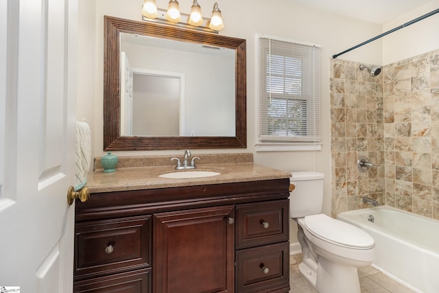 bathroom with tile patterned flooring, vanity, shower / tub combination, and toilet