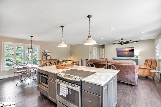 221 Lakeside Dr, Seneca, SC 29672 - kitchen with a ceiling fan, gray cabinetry, dark wood-type flooring, stainless steel appliances, and hanging light fixtures