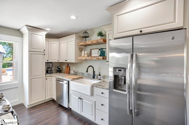 221 Lakeside Dr, Seneca, SC 29672 - kitchen featuring dark wood-style floors, open shelves, white cabinets, stainless steel appliances, and a sink