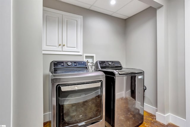 221 Lakeside Dr, Seneca, SC 29672 - washroom with washing machine and dryer, laundry area, and baseboards