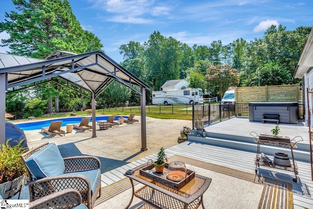 221 Lakeside Dr, Seneca, SC 29672 - view of patio with a fenced in pool, a fenced backyard, a hot tub, a gazebo, and a deck