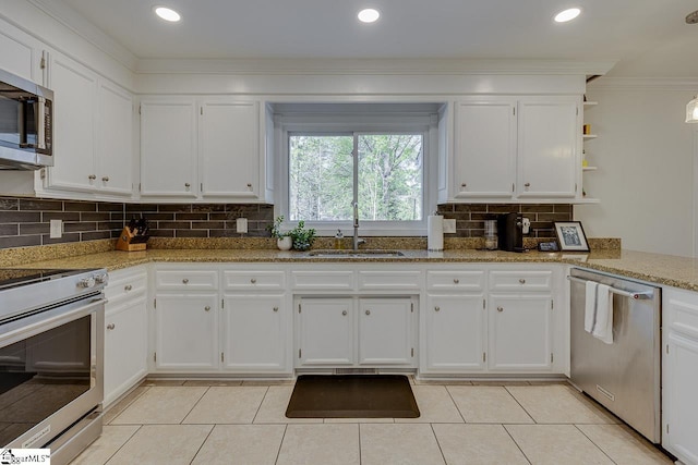 105 Berrywood Ct, Greer, SC 29650 - kitchen with open shelves, white cabinetry, stainless steel appliances, and a sink