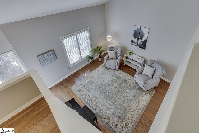 105 Berrywood Ct, Greer, SC 29650 - sitting room with baseboards, vaulted ceiling, and wood finished floors