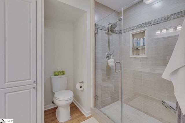 105 Berrywood Ct, Greer, SC 29650 - full bath featuring toilet, baseboards, wood finished floors, and a shower stall