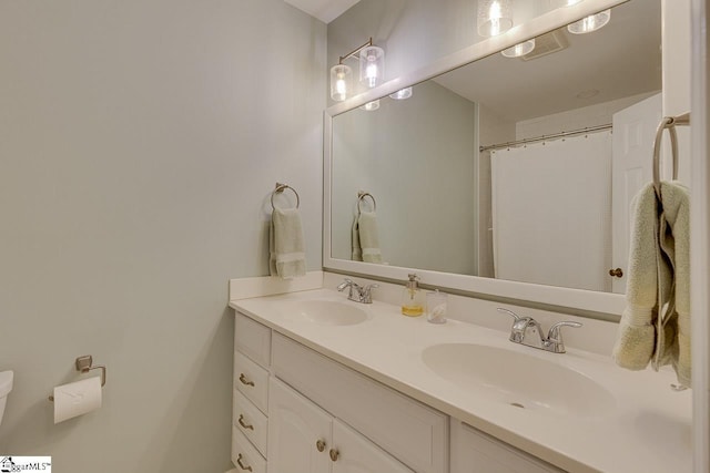 105 Berrywood Ct, Greer, SC 29650 - bathroom featuring toilet, double vanity, and a sink