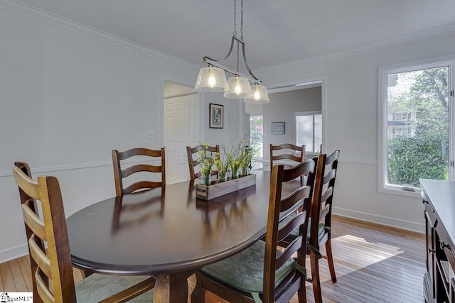 105 Berrywood Ct, Greer, SC 29650 - dining room featuring crown molding, light wood-style flooring, and a wealth of natural light