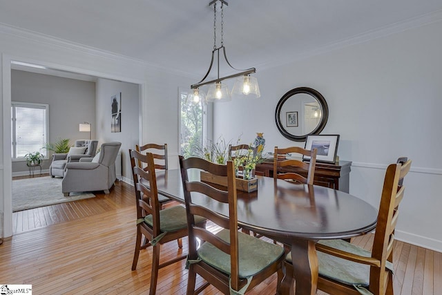 105 Berrywood Ct, Greer, SC 29650 - dining space featuring crown molding, baseboards, and light wood-style floors