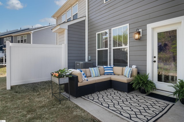 view of patio / terrace with outdoor lounge area and fence