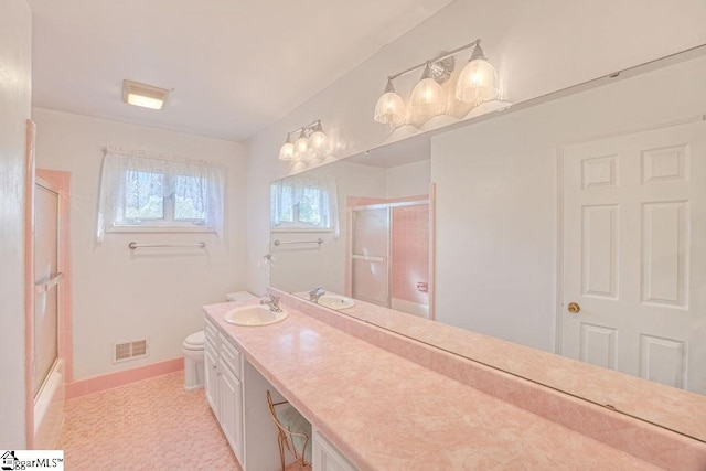 full bath featuring visible vents, baseboards, toilet, an enclosed shower, and vanity