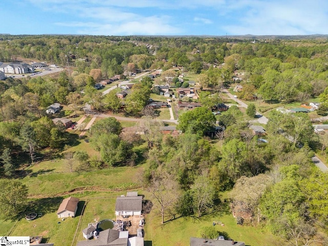 drone / aerial view with a forest view