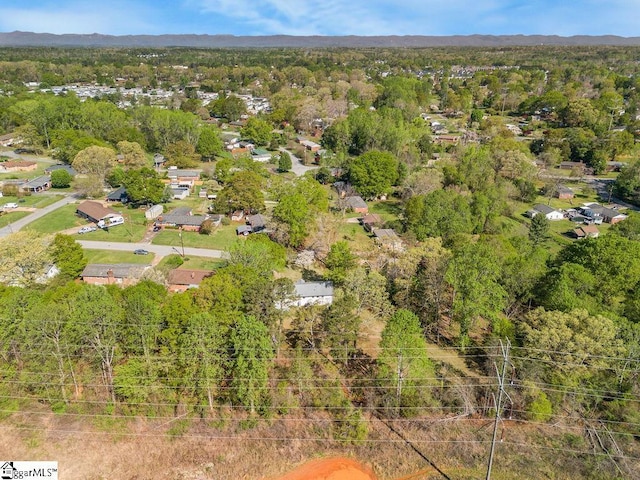 aerial view with a forest view and a mountain view