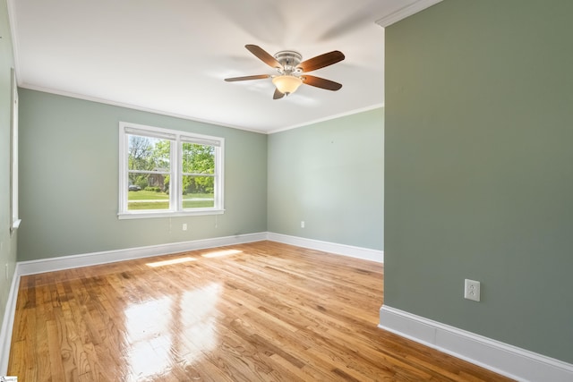 105 Pinewood Ave, Clinton, SC 29325 - empty room with crown molding, ceiling fan, wood finished floors, and baseboards