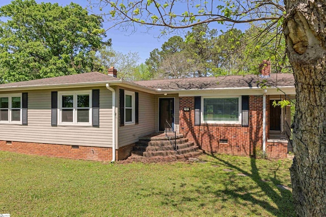 105 Pinewood Ave, Clinton, SC 29325 - view of front of home featuring crawl space, a chimney, and a front yard